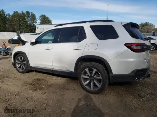 2023 Honda Pilot Elite with VIN 5FNYG1H8XPB002929, listed as a Copart auction lot 48131303 with 4,949 mi miles. Bid and sale history available at carsss.com. Image 2.
