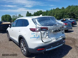 2016 Mazda CX-9 Grand Touring with VIN JM3TCBDY7G0125708, listed as a IAAI auction lot 39891843 with 133,988 mi miles. Bid and sale history available at carsss.com. Image 17.