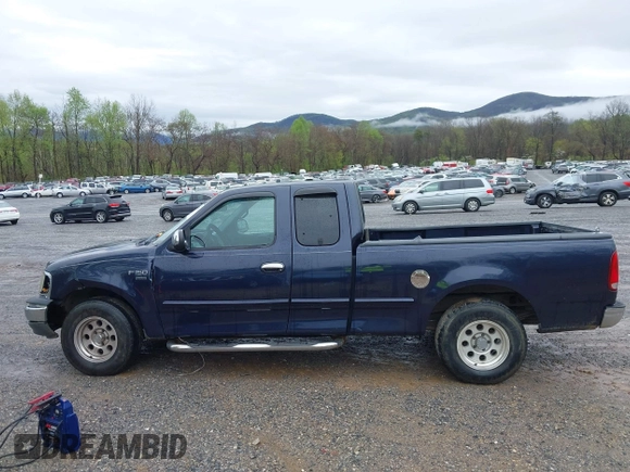 1999 Ford F-150 with VIN 1FTRX17W5XNA06036, listed as a IAAI auction lot 41897561 with 222,979 mi miles and . Bid and sale history available at DreamBid. Image 14.