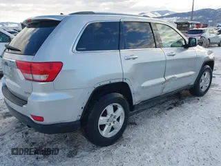 2011 Jeep Grand Cherokee Laredo with VIN 1J4RR4GG7BC584500, listed as a IAAI auction lot 41383355 with 161,722 mi miles. Bid and sale history available at carsss.com. Image 4.