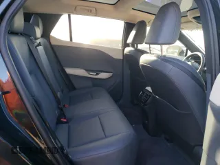 2023 Lexus RZ 450e Premium z VIN JTJAAAAB9PA007621, wystawiony jako Copart lot #80594143 z przebiegiem 7673 mil mil oraz Szkody całkowita. Historia ofert i sprzedaży dostępna na DreamBid. Obrazek 11.