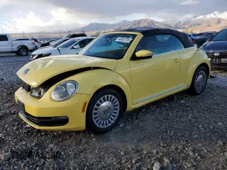 2014 Volkswagen Beetle 1.8T w/Premium z VIN 3VW517AT0EM823503, wystawiony jako Copart lot #44002725 z przebiegiem 115 797 mil mil oraz Szkoda całkowita • Salvage title. Historia ofert i sprzedaży dostępna na DreamBid. Obrazek 1.