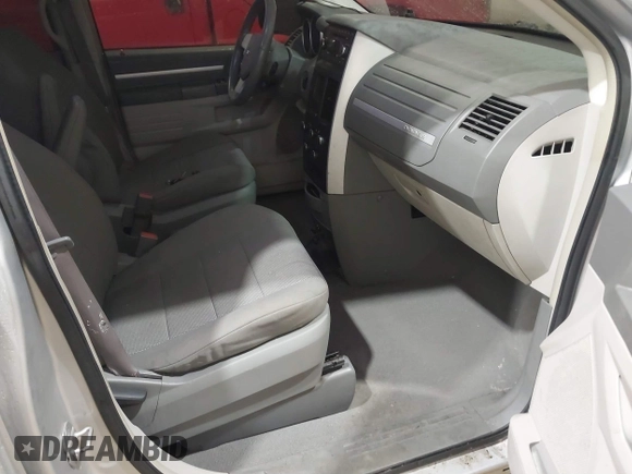 2008 Dodge Grand Caravan SXT with VIN 1D8HN54P18B129536, listed as a IAAI auction lot 41844874 with 260,000 mi miles and . Bid and sale history available at DreamBid. Image 5.