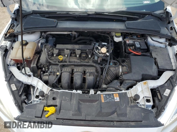 2018 Ford Focus SE z VIN 1FADP3F25JL272797, wystawiony jako Copart lot #54626215 z przebiegiem 116 679 mil mil oraz Szkoda całkowita • Salvage title. Historia ofert i sprzedaży dostępna na DreamBid. Obrazek 11.