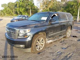 2018 Chevrolet Tahoe LT with VIN 1GNSCBKC1JR365875, listed as a IAAI auction lot 41584072 with 61,957 mi miles. Bid and sale history available at carsss.com. Image 18.