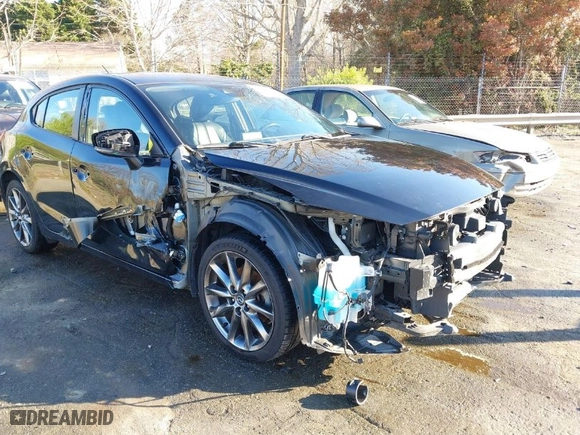 2018 Mazda Mazda3 5-Door Touring with VIN 3MZBN1L31JM200628, listed as a IAAI auction lot 41680209 with 95,656 mi miles. Bid and sale history available at carsss.com. Image 18.