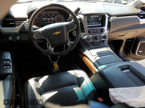 2018 Chevrolet Tahoe Premier with VIN 1GNSKCKC1JR133625, listed as a Copart auction lot 54900974 with 130,921 mi miles and Salvage title. Bid and sale history available at DreamBid. Image 8.