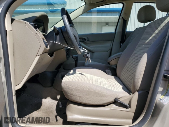 2007 Ford Focus S with VIN 1FAHP34N07W157501, listed as a Copart auction lot 52199965 with 60,369 mi miles and Salvage Title. Bid and sale history available at carsss.com. Image 7.