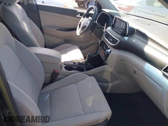 2021 Hyundai Tucson Value with VIN KM8J33A45MU391039, listed as a IAAI auction lot 42086825 with 16,910 mi miles. Bid and sale history available at carsss.com. Image 5.