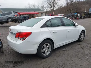 2014 Chevrolet Cruze 1LT z VIN 1G1PC5SB1E7264742, wystawiony jako IAAI lot #41740704 z przebiegiem 155 005 mil mil oraz . Historia ofert i sprzedaży dostępna na DreamBid. Obrazek 4.
