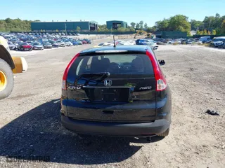 2014 Honda CR-V LX with VIN 2HKRM4H31EH677117, listed as a IAAI auction lot 40505186 with 186,122 mi miles. Bid and sale history available at carsss.com. Image 17.