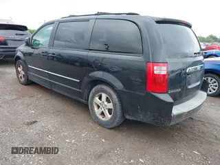 2009 Dodge Grand Caravan SXT z VIN 2D8HN54109R596185, wystawiony jako IAAI lot #42382133 z przebiegiem 207 882 mil mil oraz . Historia ofert i sprzedaży dostępna na DreamBid. Obrazek 3.