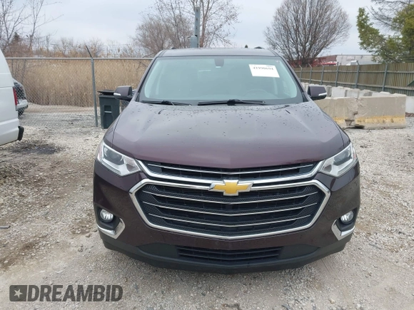 2018 Chevrolet Traverse LT Cloth z VIN 1GNERGKW2JJ282845, wystawiony jako IAAI lot #41990694 z przebiegiem 101 659 mil mil oraz . Historia ofert i sprzedaży dostępna na DreamBid. Obrazek 12.
