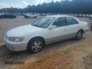 2001 Toyota Camry LE z VIN JT2BF22K310305858, wystawiony jako Copart lot #55231305 z przebiegiem 149 104 mil mil oraz Nie do naprawy • Non repairable. Historia ofert i sprzedaży dostępna na DreamBid. Obrazek 1.