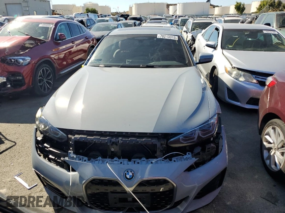 2022 BMW i4 eDrive40 z VIN WBY73AW0XNFN24679, wystawiony jako Copart lot #70213313 z przebiegiem 14 403 mil mil oraz . Historia ofert i sprzedaży dostępna na DreamBid. Obrazek 5.