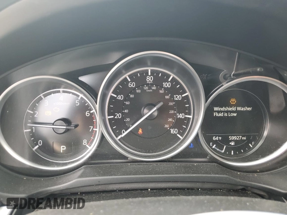2021 Mazda CX-5 Touring with VIN JM3KFACM2M0451083, listed as a Copart auction lot 49999935 with 59,927 mi miles and Salvage Title. Bid and sale history available at carsss.com. Image 9.