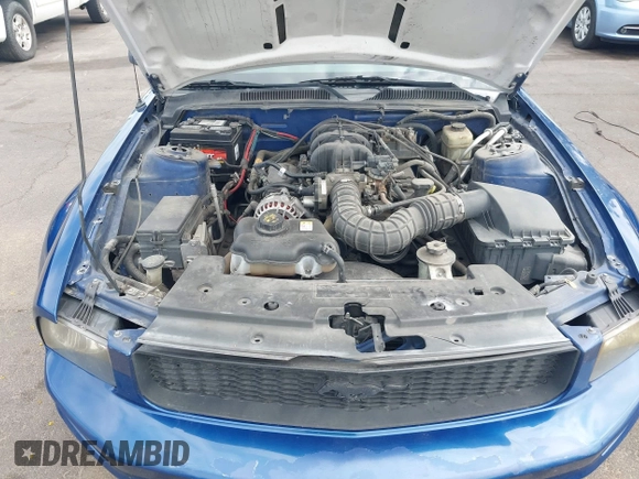 2007 Ford Mustang Deluxe z VIN 1ZVFT80N975241366, wystawiony jako IAAI lot #42408850 z przebiegiem 193 336 mil mil oraz . Historia ofert i sprzedaży dostępna na DreamBid. Obrazek 10.