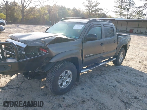 2014 Toyota Tacoma with VIN 3TMLU4EN3EM163162, listed as a IAAI auction lot 41930392 with 167,368 mi miles and . Bid and sale history available at DreamBid. Image 18.