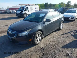 2013 Chevrolet Cruze 1LT with VIN 1G1PC5SB0D7111476, listed as a IAAI auction lot 42088469 with 70,581 mi miles and . Bid and sale history available at DreamBid. Image 2.