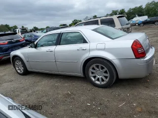 2006 Chrysler 300 C with VIN 2C3LA63H06H527558, listed as a Copart auction lot 64665314 with 74,237 mi miles and Salvage Title. Bid and sale history available at carsss.com. Image 2.