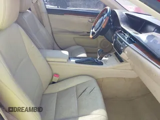2014 Lexus ES 300h Hybrid with VIN JTHBW1GG4E2064553, listed as a IAAI auction lot 42002058 with 180,455 mi miles. Bid and sale history available at carsss.com. Image 5.