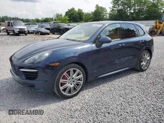 2013 Porsche Cayenne GTS с VIN WP1AD2A25DLA72349, выставлен на аукционе Copart как лот 64802875 с пробегом 61 412 миль миль и Списание • Salvage title. История ставок и продаж доступна на DreamBid. Изображение 1.