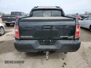 2009 Honda Ridgeline RTL with VIN 2HJYK165X9H002865, listed as a Copart auction lot 52682515 with 260,785 mi miles and Clean Title. Bid and sale history available at carsss.com. Image 6.