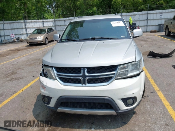2012 Dodge Journey SXT with VIN 3C4PDDBG1CT249368, listed as a IAAI auction lot 42412217 with 151,680 mi miles and . Bid and sale history available at DreamBid. Image 13.