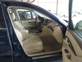 2015 Infiniti Q70 z VIN JN1BY1AP9FM542429, wystawiony jako IAAI lot #41903214 z przebiegiem 139 255 mil mil oraz . Historia ofert i sprzedaży dostępna na DreamBid. Obrazek 5.