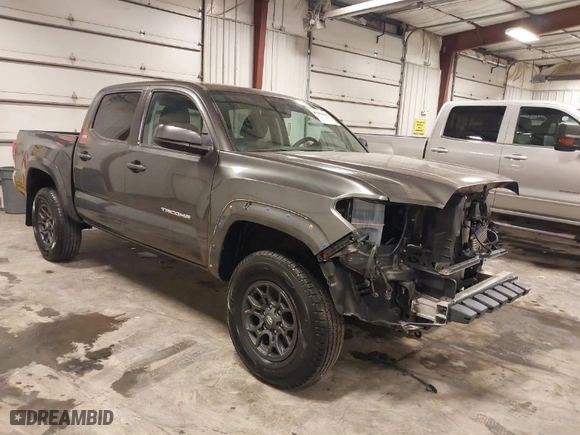 2019 Toyota Tacoma 4WD SR with VIN 3TMCZ5AN9KM275537, listed as a IAAI auction lot 41956988 with 102,933 mi miles. Bid and sale history available at carsss.com. Image 1.