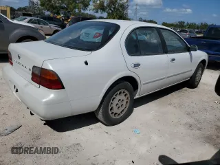1995 Nissan Maxima GLE с VIN JN1CA21D6ST059369, выставлен на аукционе Copart как лот 74794884 с пробегом 246 806 миль миль и Списание • Salvage title. История ставок и продаж доступна на DreamBid. Изображение 3.
