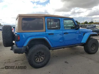 2021 Jeep Wrangler Unlimited Sahara High Altitude with VIN 1C4HJXEM3MW770622, listed as a Copart auction lot 76144874 with 71,886 mi miles and Salvage title. Bid and sale history available at DreamBid. Image 3.
