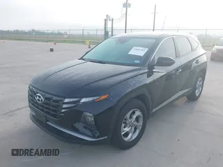 2022 Hyundai Tucson SE with VIN 5NMJA3AE7NH060409, listed as a IAAI auction lot 41884283 with 29,458 mi miles and . Bid and sale history available at carsss.com. Image 6.