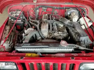 1991 Jeep Wrangler с VIN 2J4FY29S5MJ102367, выставлен на аукционе Copart как лот 82873294 с пробегом 71 908 миль миль и Списание • Salvage title. История ставок и продаж доступна на DreamBid. Изображение 13.