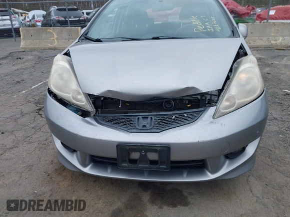 2009 Honda Fit Sport with VIN JHMGE88429S059170, listed as a IAAI auction lot 42091260 with 135,822 mi miles. Bid and sale history available at carsss.com. Image 6.