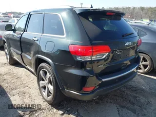 2014 Jeep Grand Cherokee Limited with VIN 1C4RJEBGXEC389361, listed as a IAAI auction lot 41772366 with 122,473 mi miles. Bid and sale history available at carsss.com. Image 3.