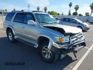2000 Toyota 4Runner SR5 z VIN JT3HN86R9Y0306011, wystawiony jako IAAI lot #42328773 z przebiegiem 213 360 mil mil oraz . Historia ofert i sprzedaży dostępna na DreamBid. Obrazek 1.