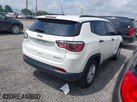 2018 Jeep Compass Sport with VIN 3C4NJCAB0JT124679, listed as a IAAI auction lot 42720262 with 119,267 mi miles and . Bid and sale history available at DreamBid. Image 4.