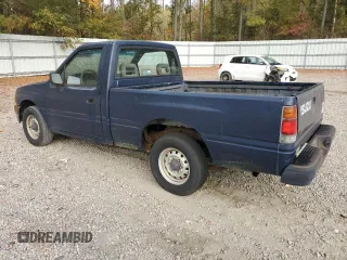 1993 Isuzu Pickup S z VIN 4S1CL11L2P4207469, wystawiony jako Copart lot #79279374 z przebiegiem 144 885 mil mil oraz Tytuł czysty. Historia ofert i sprzedaży dostępna na DreamBid. Obrazek 2.