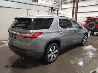 2018 Chevrolet Traverse LT Leather with VIN 1GNEVHKW2JJ220525, listed as a IAAI auction lot 41570668 with 147,721 mi miles. Bid and sale history available at carsss.com. Image 4.