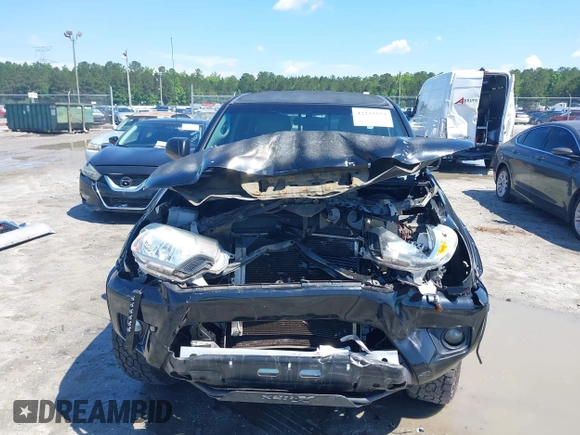 2015 Toyota Tacoma z VIN 3TMLU4EN3FM186765, wystawiony jako IAAI lot #42235553 z przebiegiem 183 878 mil mil oraz . Historia ofert i sprzedaży dostępna na DreamBid. Obrazek 13.