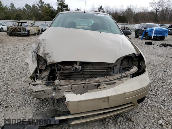 2007 Ford Focus S with VIN 1FAFP34N07W242359, listed as a Copart auction lot 61677025 with 164,445 mi miles and Salvage title. Bid and sale history available at DreamBid. Image 5.