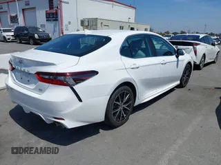 2023 Toyota Camry SE with VIN 4T1G11AK0PU736081, listed as a IAAI auction lot 42090419 with 32,303 mi miles and . Bid and sale history available at DreamBid. Image 4.