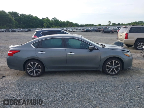 2016 Nissan Altima SR with VIN 1N4AL3AP2GC220196, listed as a IAAI auction lot 42362704 with 104,939 mi miles and . Bid and sale history available at DreamBid. Image 13.
