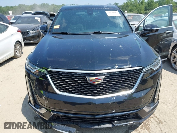 2021 Cadillac XT6 Premium Luxury with VIN 1GYKPDRS0MZ153523, listed as a IAAI auction lot 42770895 with 19,843 mi miles and . Bid and sale history available at DreamBid. Image 6.
