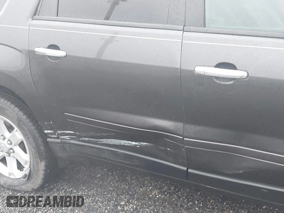 2013 GMC Acadia SLE with VIN 1GKKRNED6DJ167085, listed as a IAAI auction lot 41530948 with 206,213 mi miles. Bid and sale history available at carsss.com. Image 6.