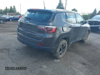 2018 Jeep Compass Sport z VIN 3C4NJCAB0JT267454, wystawiony jako IAAI lot #42266843 z przebiegiem 116 775 mil mil oraz . Historia ofert i sprzedaży dostępna na DreamBid. Obrazek 4.