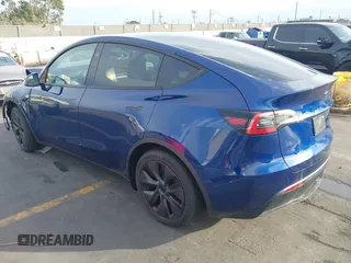 2025 Tesla Model Y Long Range with VIN 7SAYGDED2SF219423, listed as a IAAI auction lot 40984912 with 728 mi miles and . Bid and sale history available at DreamBid. Image 3.