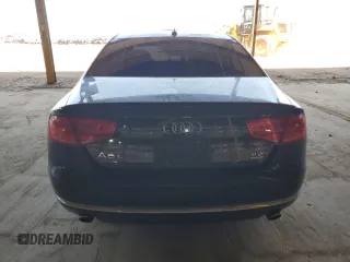 2011 Audi A8 z VIN WAURVAFD5BN019557, wystawiony jako Copart lot #54801035 z przebiegiem 148 688 mil mil oraz Tytuł czysty. Historia ofert i sprzedaży dostępna na DreamBid. Obrazek 6.