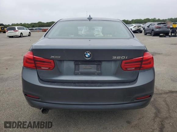 2017 BMW 3 Series 320i xDrive with VIN WBA8E5G55HNU42092, listed as a Copart auction lot 59711095 with 77,997 mi miles and Salvage title. Bid and sale history available at DreamBid. Image 6.